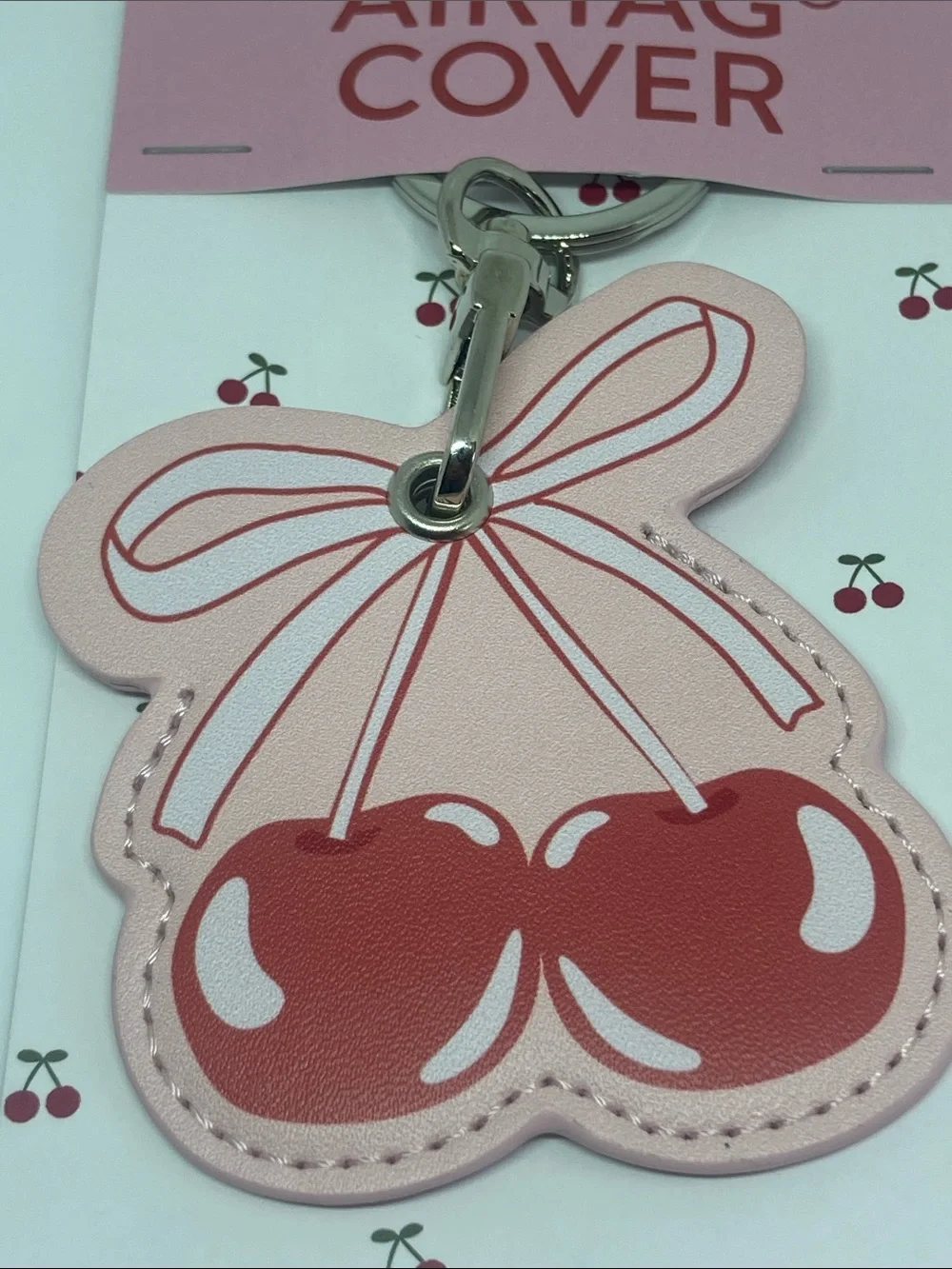 Tilly's Pink Cherry Airtag Cover Keychain